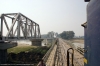 View from the cab of NKE YDM4 6682 as it runs the short distance between Jhanjharpur Jct & Lohna Road with 52520 0815 Laukaha Bazar - Sakri Jct; the new BG bridge will become rail only and the old MG bridge will become road traffic only upon conversion