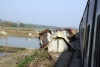 The remains of WDM3A crash victims, UDL 16411 & BWN 16089, lay strewn at the side of the tracks at Gour Malda, surrounded by various bits of wheels and wagon