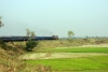 HWH WDM3A 18997 curves off the main BWN - ASN line at Khana Jct, onto the Bolpur line, with 15657 0635 Sealdah - Guwahati Jct