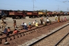 Workers at Tomka on the Cuttack - Barbil line. Spot the under age ones......