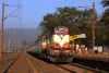 VSKP WDM3A 18802 waits in the morning sunshine at the dustbowl that is Barbil with 18415 0805 Barbil - Puri
