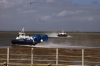 One Hovercraft departs as the other arrives at Ryde