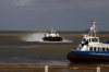 One Hovercraft departs as the other arrives at Ryde