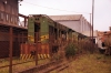 Bombardier MX615's 502, 503 & 500 rust away just inside th gate of Limbe Workshops