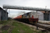 YDM4 6614 passes through Arau with a northbound cement train