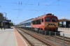 MAV M41 418325 waits departure from Pupokladany with 365 1313 Puspokladany - Oradea; with M41 418321 stabled in the sidings after arriving with 364 1130 Oradea - Puspokladany