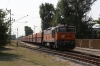 AWT 753711 passes through Balatonfenyves with a freight