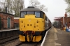 31108 waits at Thuxton with the 1400 Dereham - Wymondham Abbey