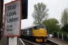 31108 waits at Thuxton with the 1400 Dereham - Wymondham Abbey