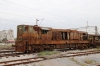 A very demic ex JZ 661273 in the knackers line on shed at Podgorica