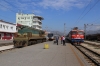 ZCG Cargo 644015 stands in the station at Podgorica, acting as station pilot, while ZCG 461039 arrives with 6103 0930 Bijelo Polje - Bar local