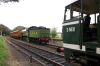 31207 waits at Weybourne with the 1200 Sheringham - Holt, while B12 Steam loco 6572 arrives with the 1200 Holt - Sheringham