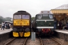 31207 stands at Sheringham having arrived with the 1415 Holt - Sheringham; while WC Railways' 47245 stands in the adjacent platform having arrived on the rear of a mainline charter from London