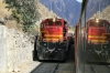 Running through the Andes at Carcay, on board FCCA's 0700 Huancayo - Lima Los Desamparados tourist train; led by FCCA GE C30-7 1007, which is passing FCCA GE C39-8 1027 in the loop