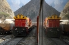 Running through the Andes at Surco, on board FCCA's 0700 Huancayo - Lima Los Desamparados tourist train; led by FCCA GE C30-7 1007, which is passing FCCA GE C30-7 1001 in the loop