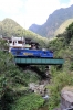 Peru Rail GM G12 #510 departs Machu Picchu with Expedition Train 74 (which includes local coaches) 1455 Machu Picchu - Ollantaytambo