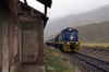 Peru Rail MLW DL560 #659 leads train 20 0800 Cusco Wanchaq - Puno as it stands at the summit of La Raya at 4319m