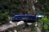 Peru Rail Alco DL535 #487 (rebuilt from DL532 #357) brings the stock for the Hiram Bingham Express up through Aguas Calientes to shunt it back into Machu Picchu station; train 12 1750 Machu Picchu - Cusco Poroy
