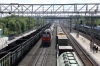 RZD 2ES6-420 runs through Ob with a westbound freight on the Trans-Siberian Railway