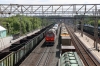 RZD 2ES6-143 runs through Ob with a westbound freight on the Trans-Siberian Railway