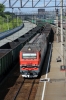 RZD 2ES6-341 runs through Ob with a eastbound freight on the Trans-Siberian Railway