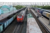 RZD 2ES6-053 runs through Ob with a westbound freight on the Trans-Siberian Railway, while VL10-1160 heads east at the same time