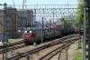 RZD 3ES5K-139 waits to depart the staging area at Vladivostok Port with a lengthy freight, with classmate 3ES5K-699 drawing in alongside