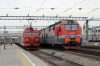 RZD EP1-239 waits to depart Khabarovsk 1 with 099E 0051 Vladivostok - Moskva Yaroslavskaya while 3ES5K-699 passes through with a westbound freight