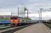 RZD 2TE10UT-0026A/B wait to depart Tynda with 075E 0457 Neryungri Pas. - Moskva Kazanskaya. 3TE10MK-2572B/V/A stand in the adjacent platform about to be detached from a freight