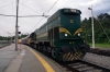 SZ 664105 departs Postojna while dragging R1605 0340 Maribor - Koper from Borovnica to Prestranek