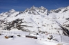GGB Bhe4/8 3044 descends from Riffelberg towards Zermatt with an empty ski train