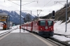 RhB Ge4/4 II #612 arrives at Scuol-Tarasp with RE1241 1044 Disentis - Scuol-Tarasp while Tm2/2 #111 waits to shunt a freight wagon off the rear to be unloaded immediately and forwarded by road to its destination