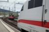 SBB Re4/4 11196 arrives into Olten with IR2327 1404 Basel - Locarno while DB ICE 401587/087 waits to depart with ICE277 0633 Berlin Hbf - Interlaken Ost