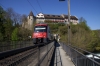 SBB EMU 514052 exits the tunnel beneath Laufen Castle, right by the Rhine Falls at Neuhausen