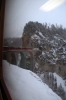 RhB Ge 4/4 III 643 crosses a viaduct at Filisur with RE1125 0858 Chur - St Moritz