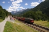 RhB Ge4/4 II #619 departs Guarda with RE1244 1340 Scuol-Tarasp - Disentis (with freight on the rear)