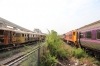 SRT Bang Sue Shed Demic Line - 3011, 579 & 515? with 4549 running by on the main line with an ECS that had 4407 coupled with its own rake at the rear