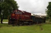 A&M Alco C420 #68 (#44 rear) does a photo run-by at Bentonville (Phyllis Street) with the 0800 Springdale - Bentonville - Springdale NRHS Convention Special