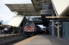 Caltrain F40PH-2 #913 departs Millbrae with 427 1000 San Jose Diridon - San Francisco