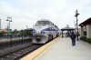 Amtrak F59PHI #454 runs through Orange with 565 0657 San Diego - LA Union