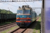 UZ VL10-1313 runs by its train at Mostyka 2 before working 052 0823 Przemsyl Glowny - Lviv forward to destination