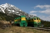 WP&YR - GE/MLW combination 95, 110, 100 at Fraser after arrival with 23 1230 Skagway - Fraser, Bombardier #114 is stabled with its works train